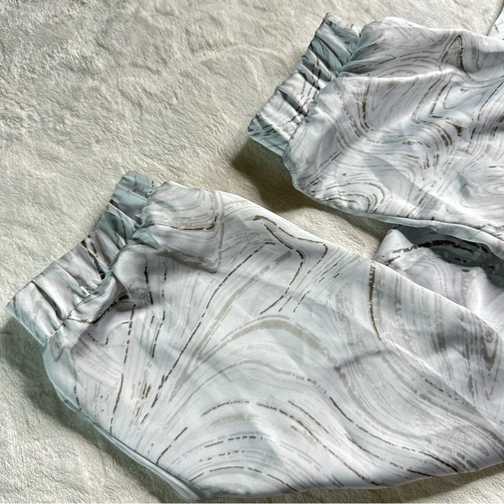 Caramela Marble Print Satin Halter Top Jumpsuit in White and Gray Womens Small